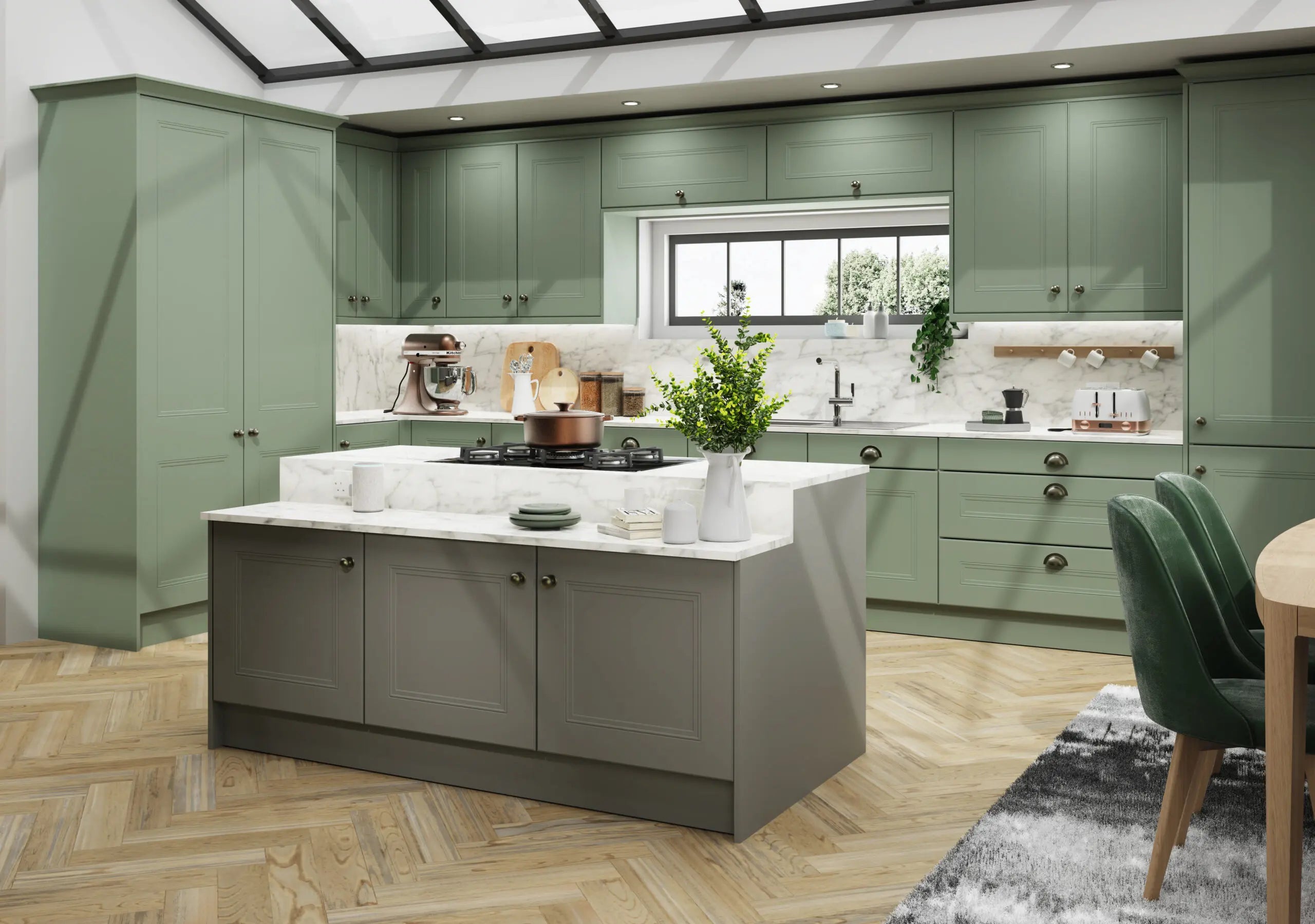 Bella Buxton supermatt sage green kitchen with an island and white marble worktop.