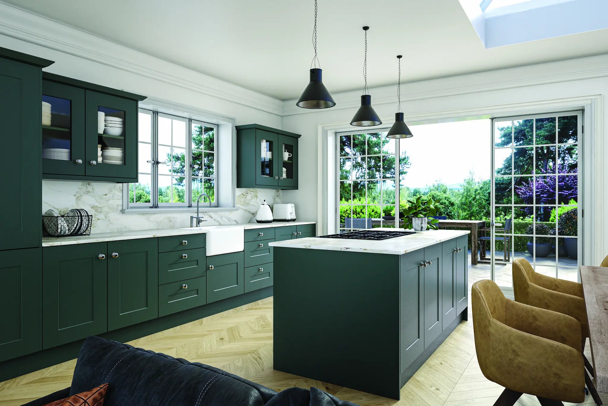 Bella Carrick Matt Kombuu Green kitchen,featuring glazed doors and an island. White marble worktops.