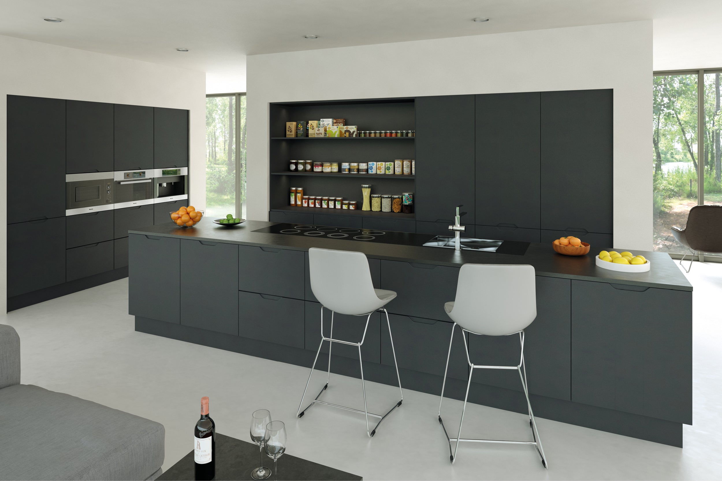 Modern kitchen with dark grey cabinets, white countertops, and white chairs.