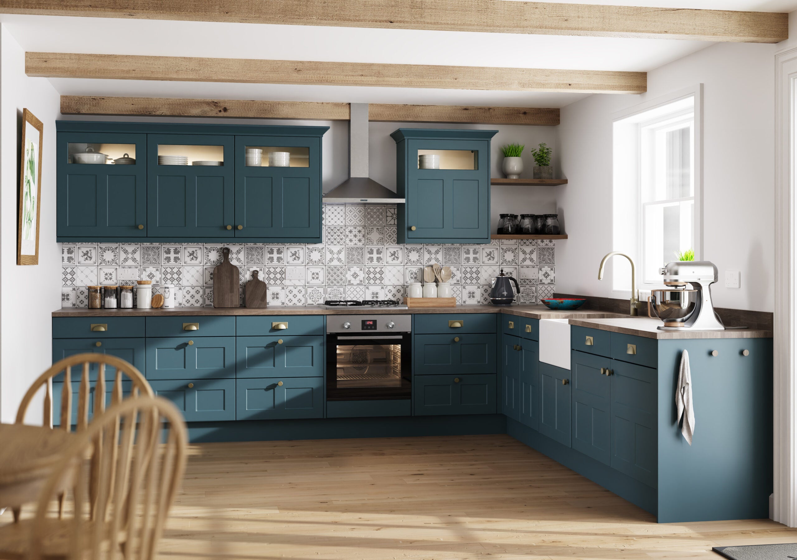 Modern kitchen with blue cabinets, wooden floor, and white walls.