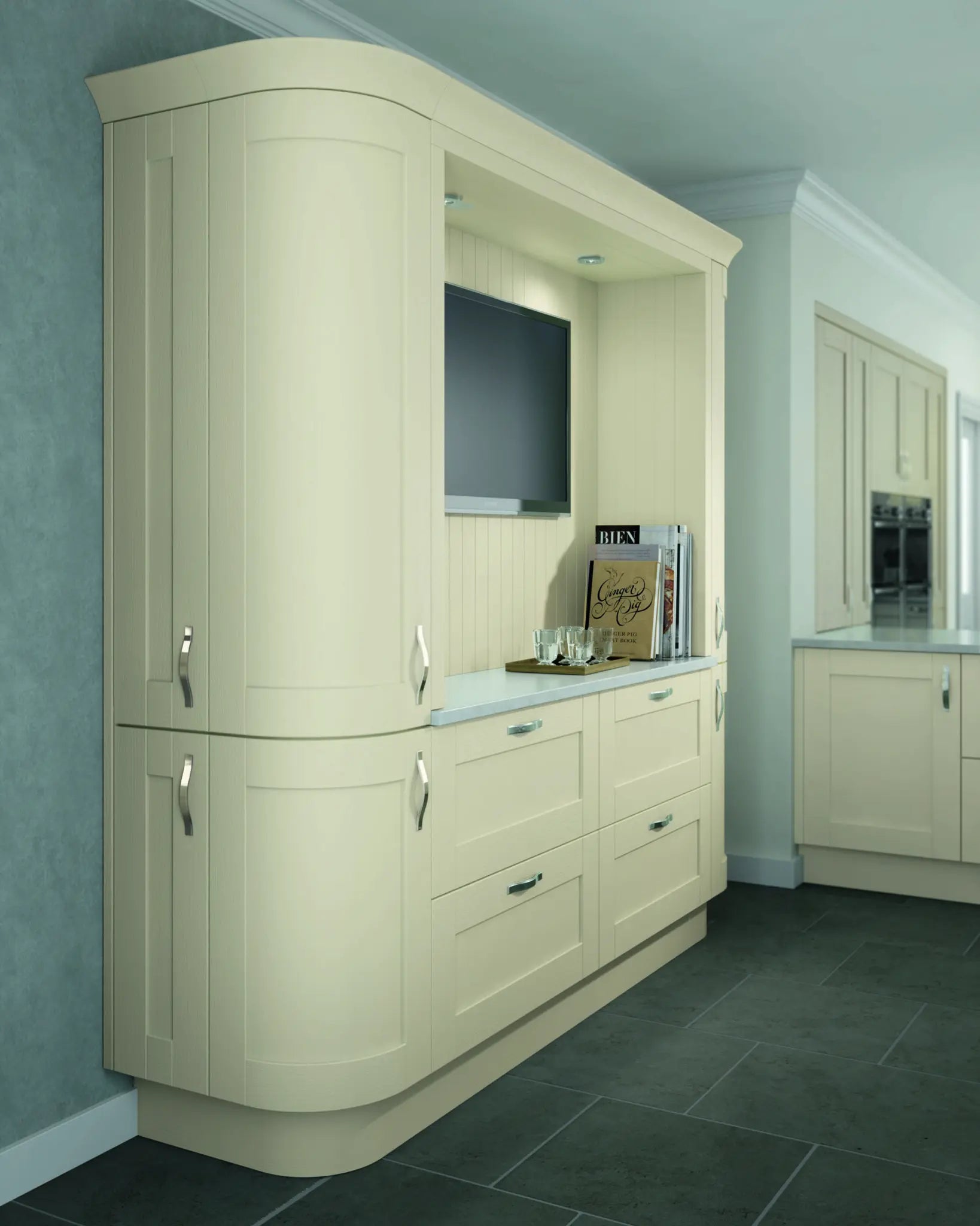 Shaker style kitchen featuring curved doors, cornice and plinth. Painted in a Mussel finish.