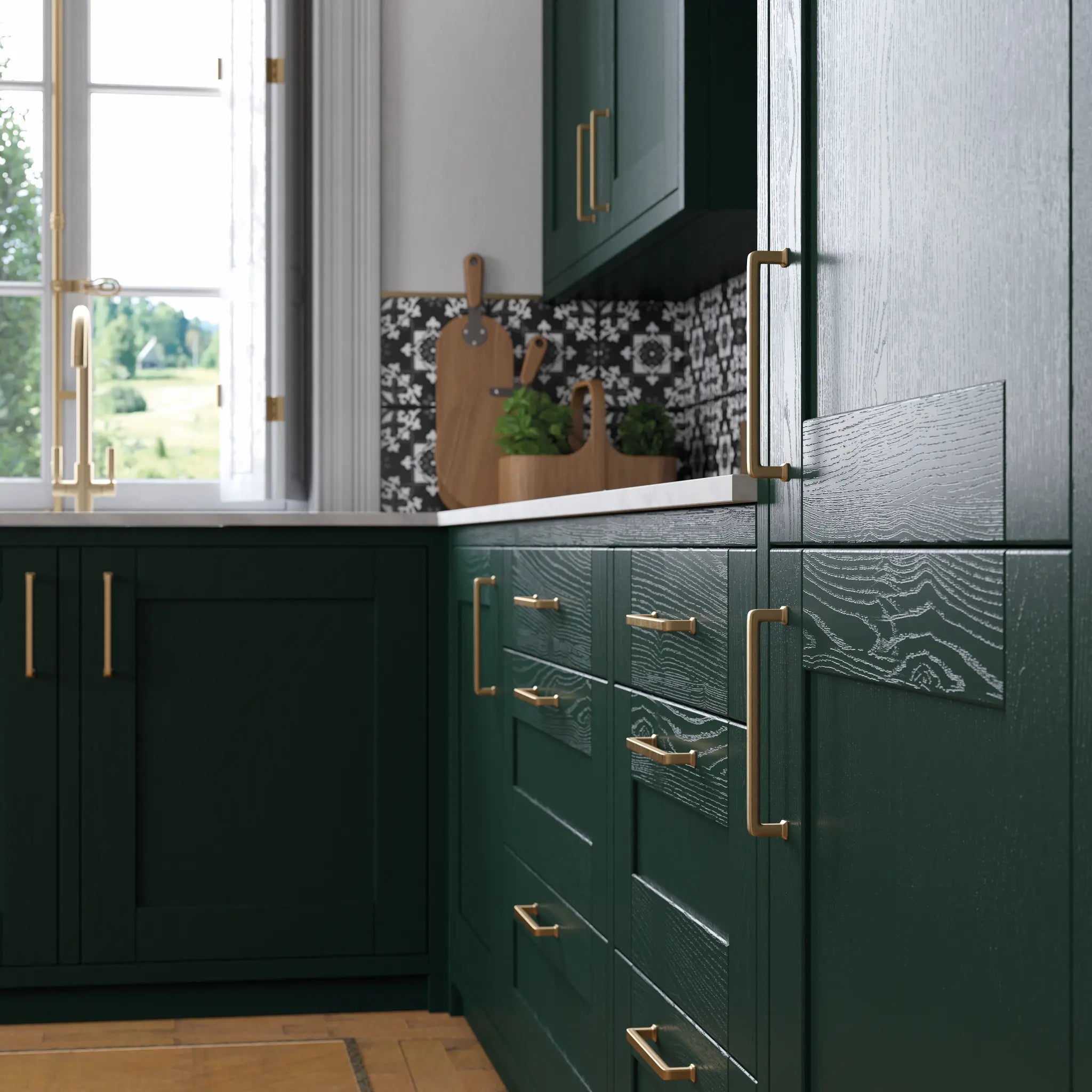 Cambridge kitchen with fir green cabinet doors and gold handles.