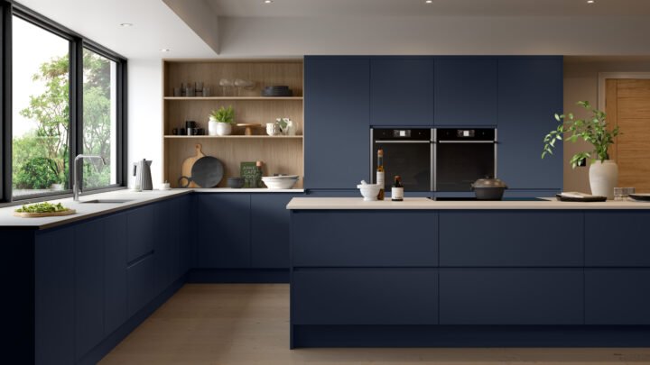 Modern Jayline kitchen with blue cabinets and white countertops