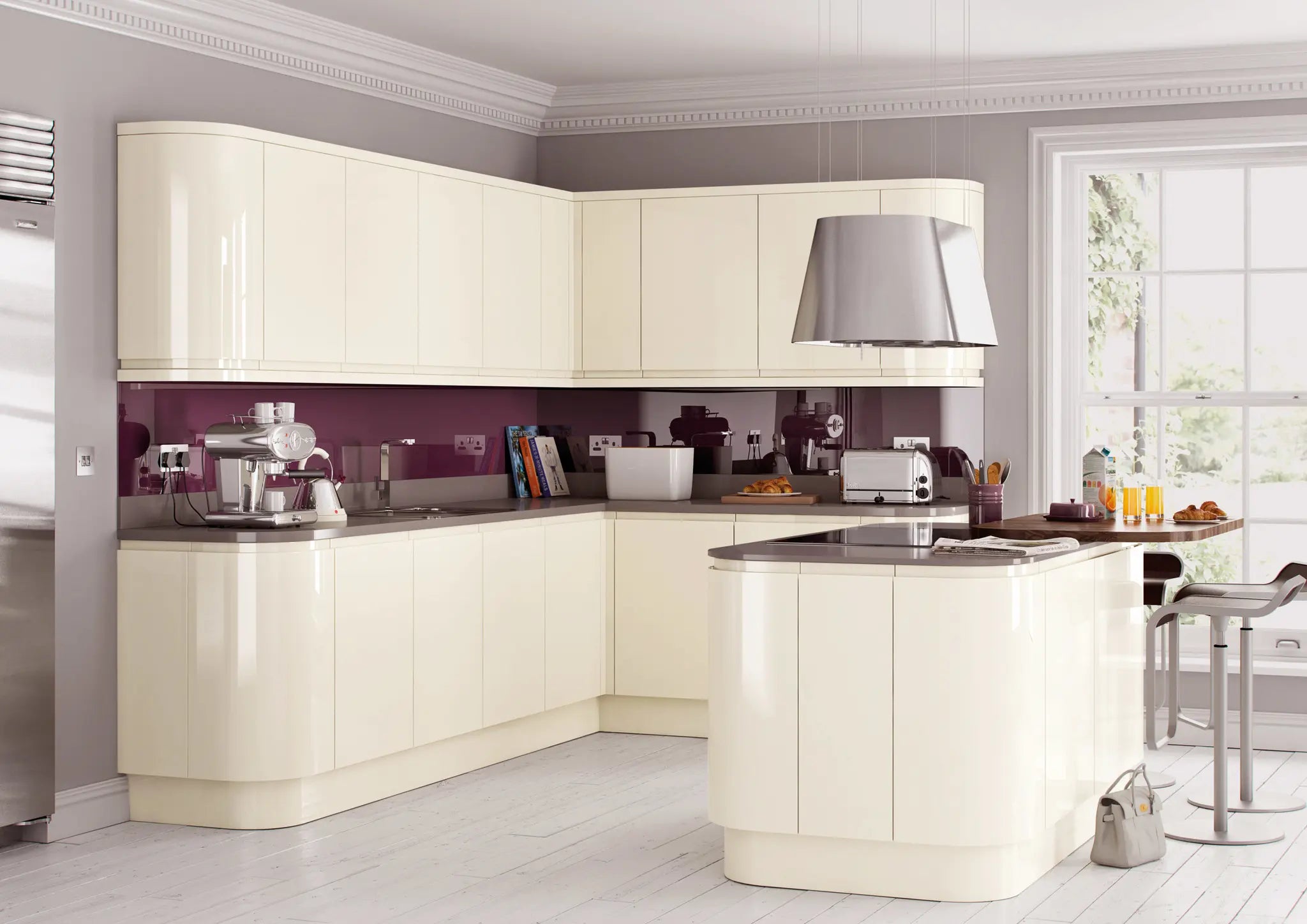 Modern Lucente gloss cream kitchen with an island. Curved doors on wall and base units as well as the island.