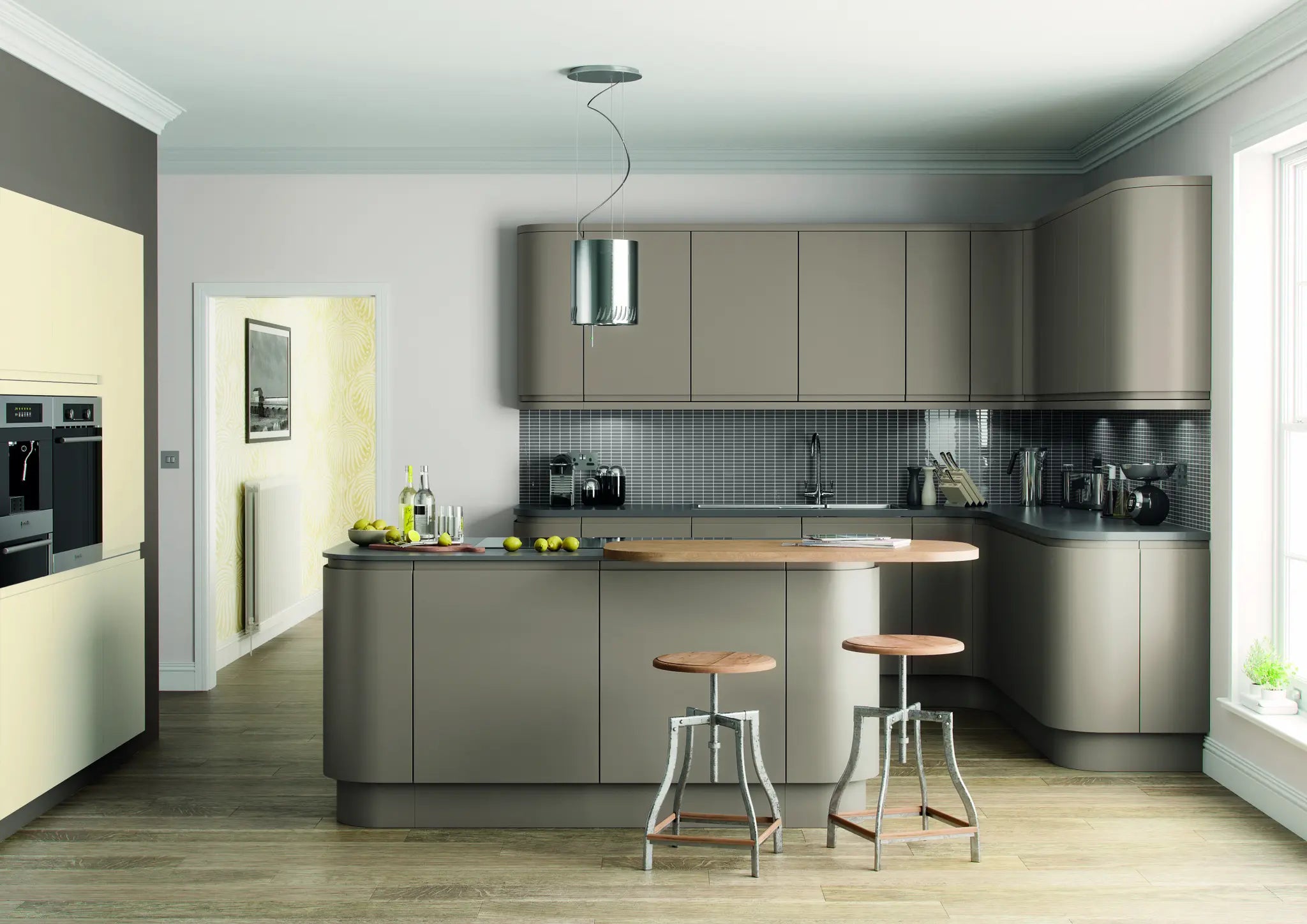 Modern Lucente kitchen with grey cabinets, island, and bar stools.