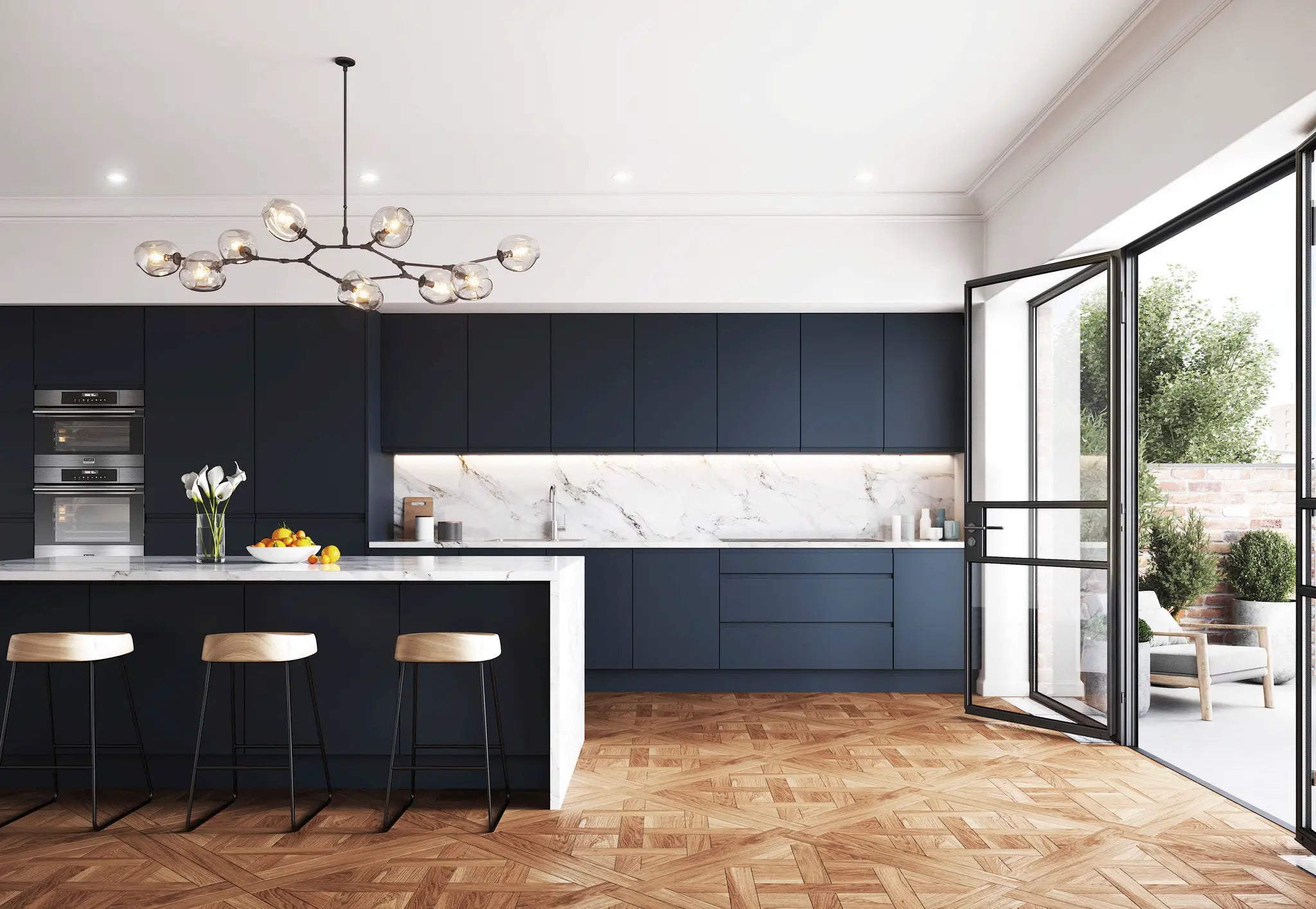 Modern Lucente kitchen with indigo doors, white countertops, and a chandelier.