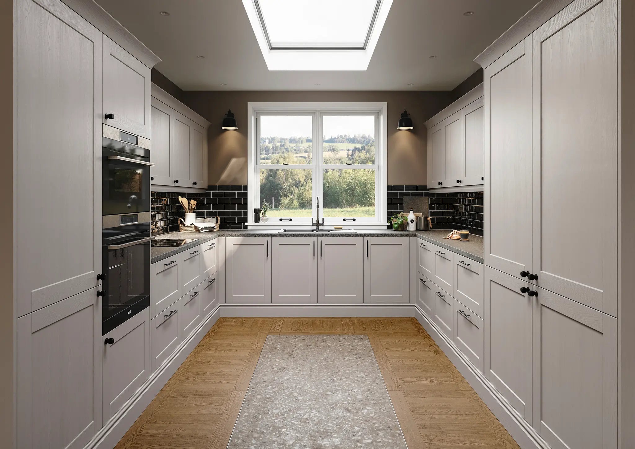 Rydal kitchen with cashmere doors, plinth and cornice. Black appliances, and a large window.