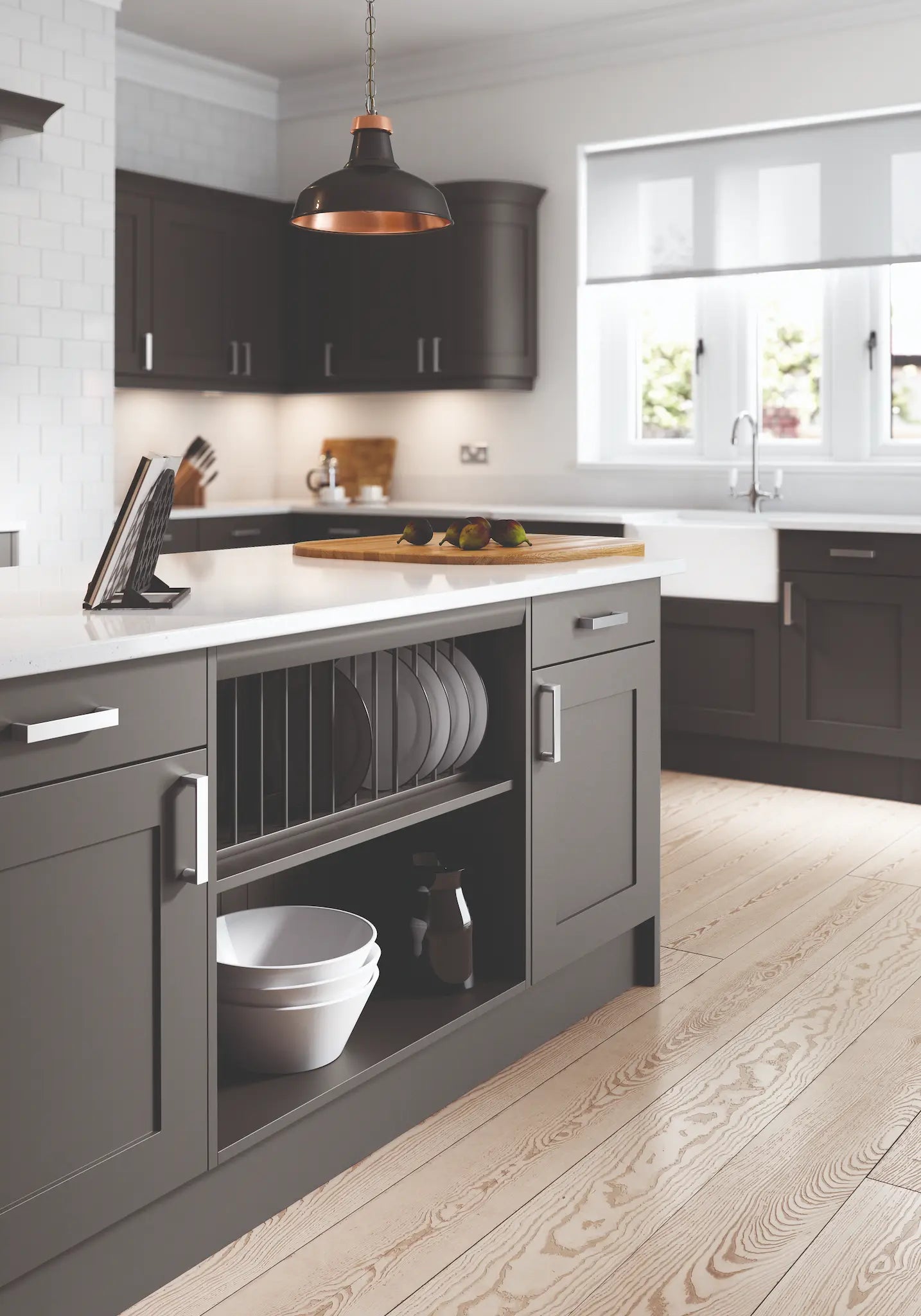 Oxford kitchen with anthracite doors and cabinets, white countertops, and wooden flooring. A plate-rack is prominent.