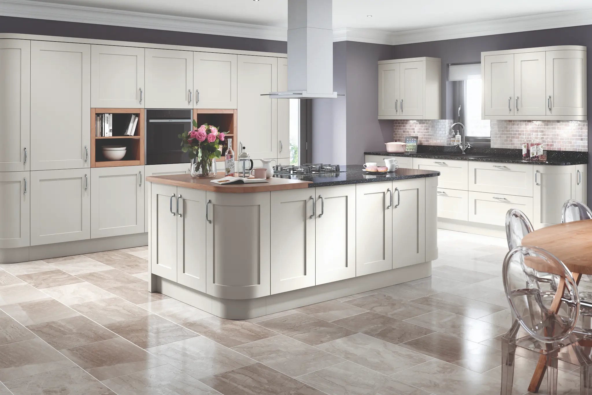 Oxford kitchen with light grey cabinets, island, and decorative elements.