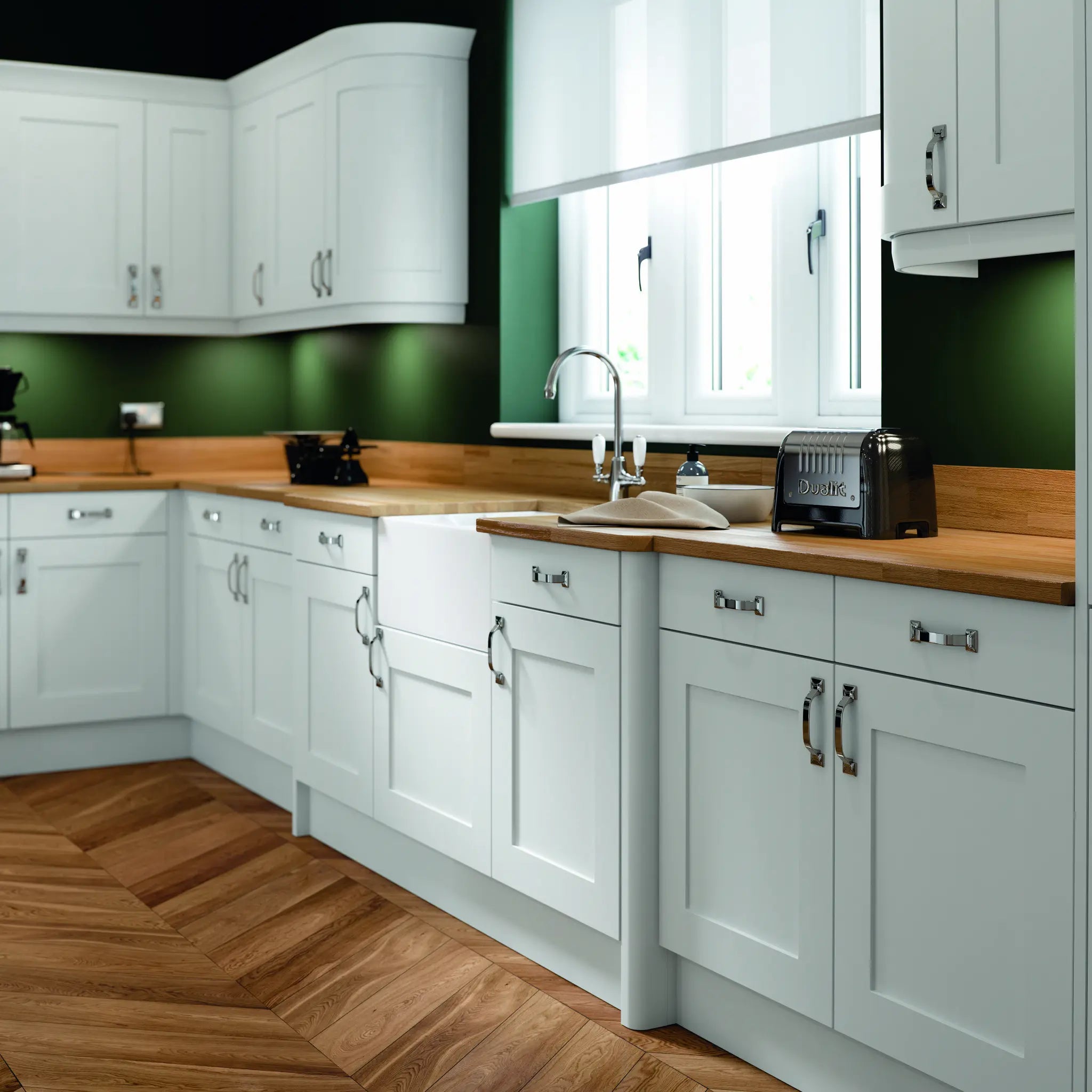 Modern white shaker kitchen with white cabinets, wooden countertops, and green walls.