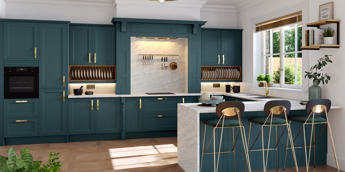 Modern kitchen with teal cabinets, white countertops, and bar stools.