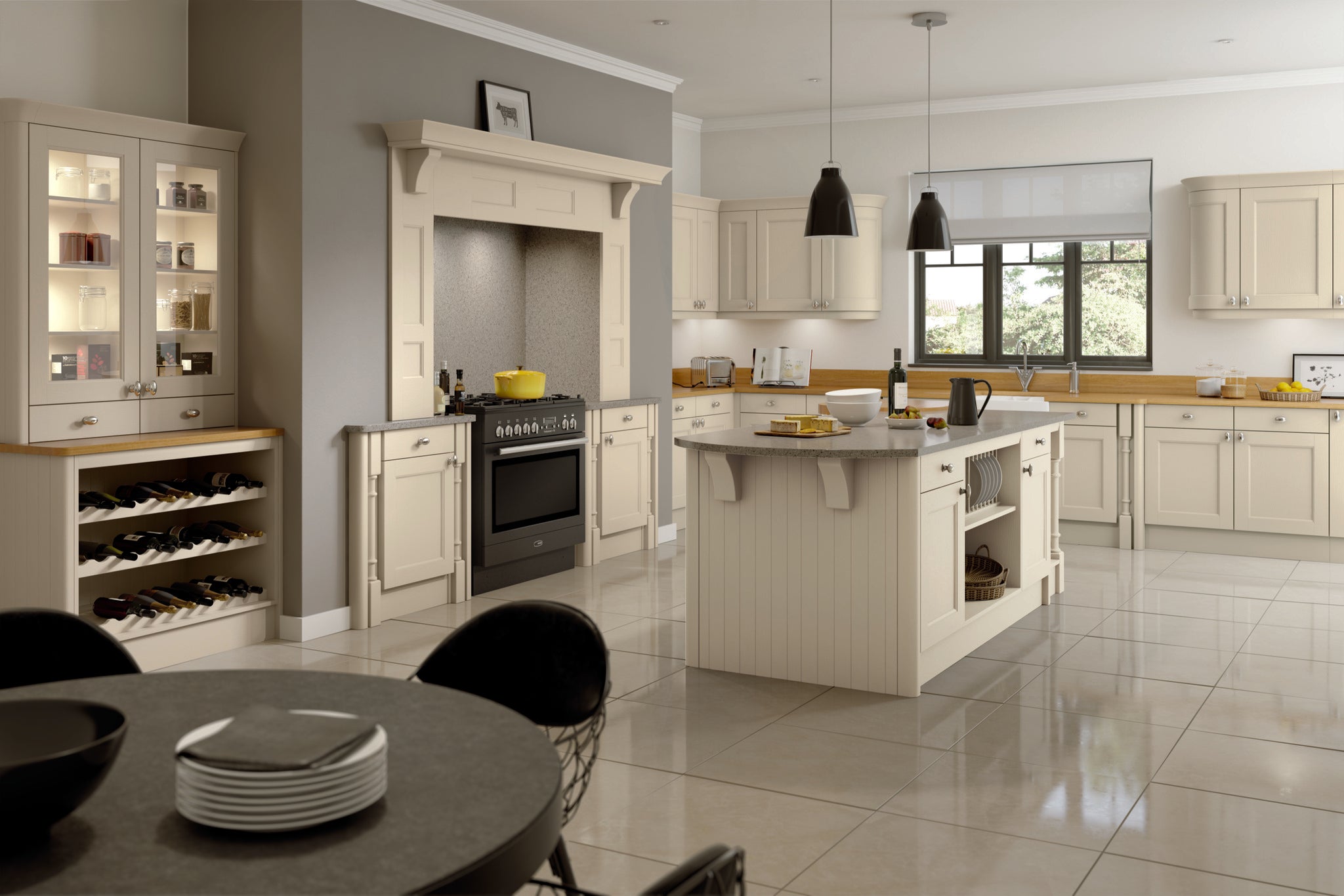 Modern kitchen with off white cabinets, black range cooker, and a dining table.