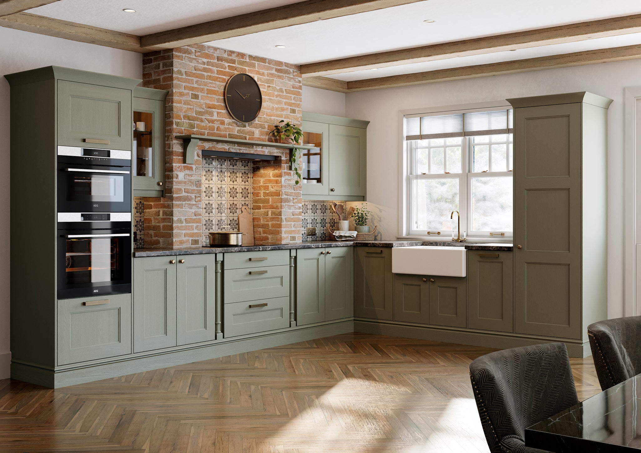 Modern kitchen with green cabinets, brick wall, and wooden floor.
