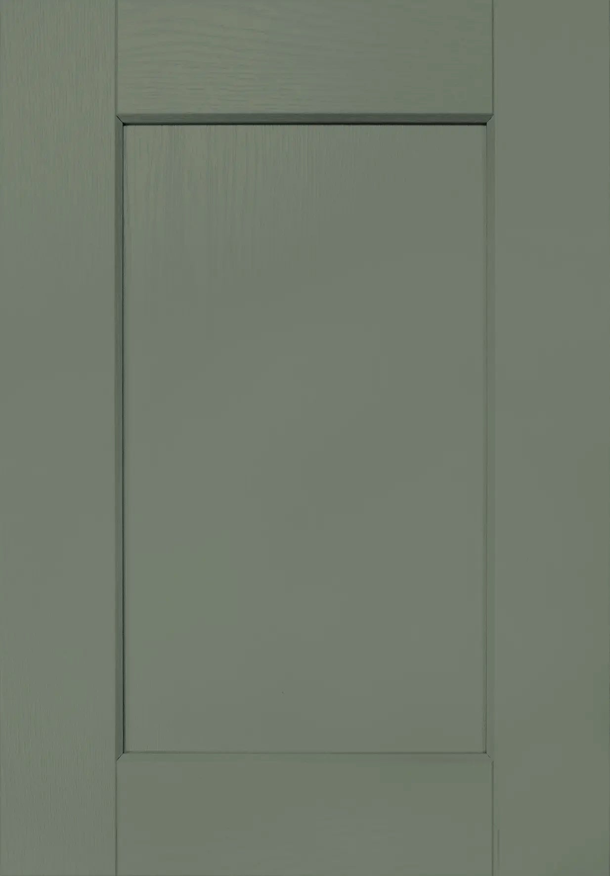 Close up image of a Rydal Reed Green kitchen door showing the grain effect finish.