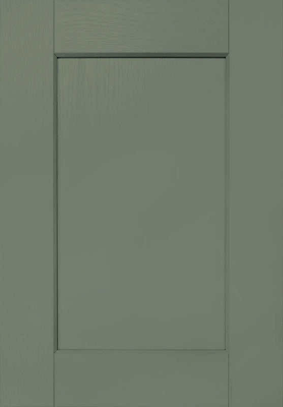 Close up image of a Rydal Reed Green kitchen door showing the grain effect finish.