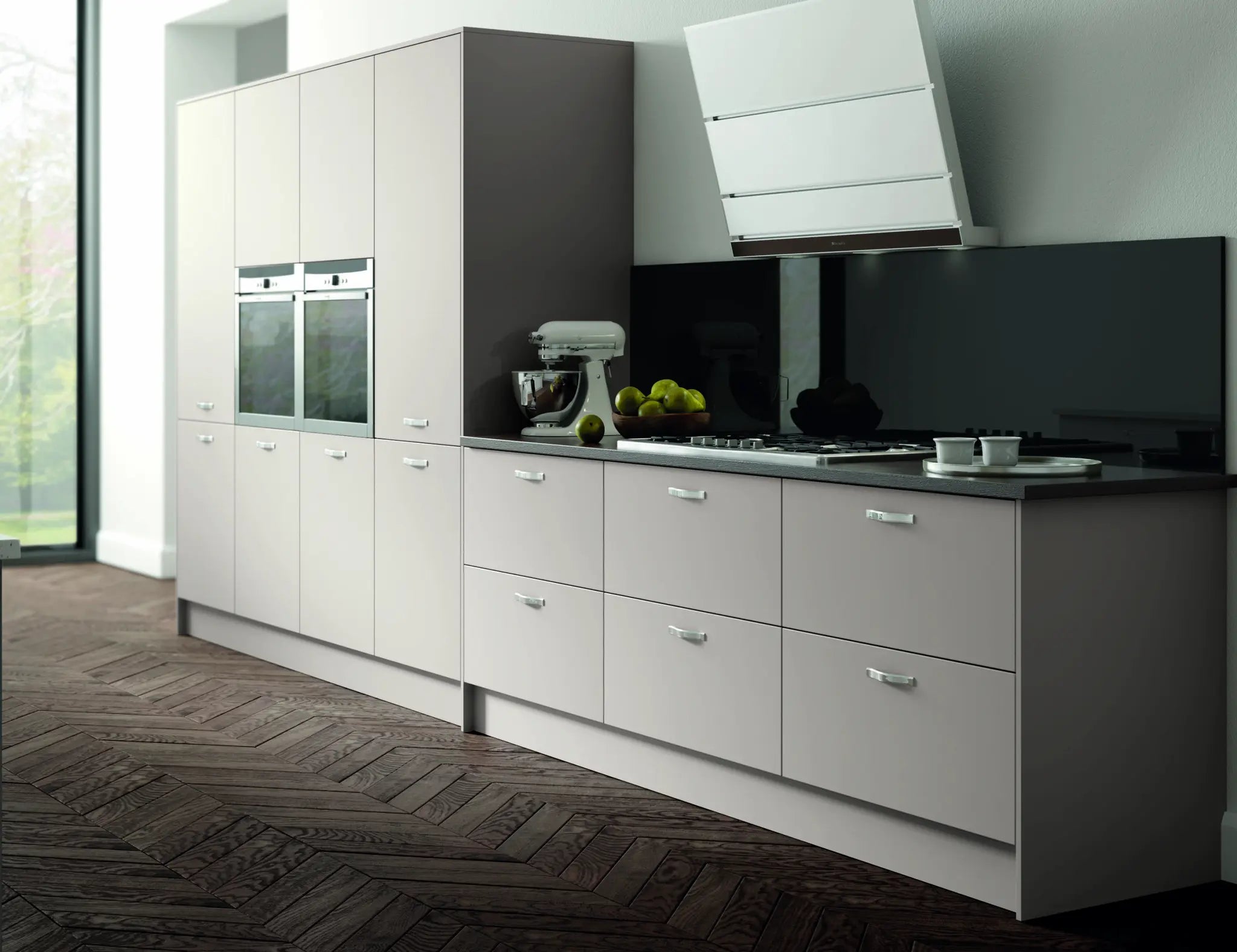 Modern Vivo kitchen with cashmere cabinets, black appliances, and a wooden floor.