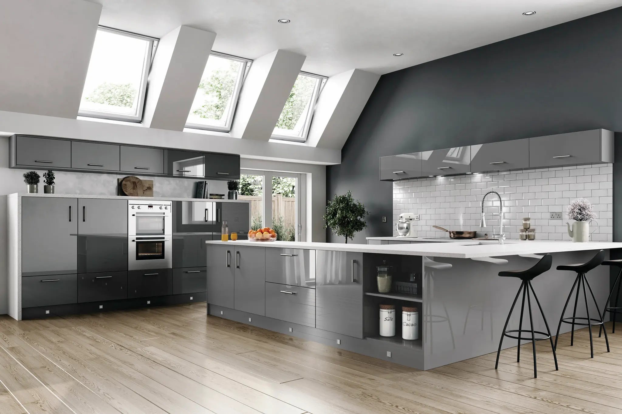 Modern Vivo kitchen with dust grey cabinets, white countertops, and skylights. Features plinth, breakfast panel and a curved end post.