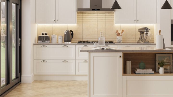 Waterford kitchen with supermatt white cabinet doors, tiled backsplash, and stainless steel appliances.