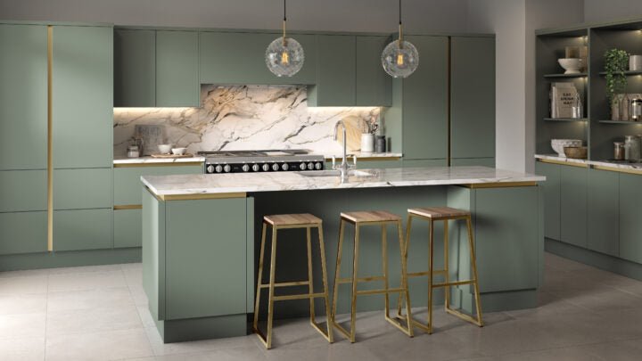 Zurfiz kitchen with green cabinets, marble backsplash, and bar stools.