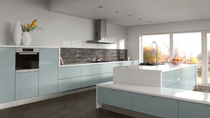 Modern kitchen with light blue cabinets and white countertops