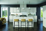Bella Ashford matt dove grey kitchen and island with white worktops, stools, and grey walls.