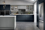 Modern kitchen with dark blue cabinets, stainless steel appliances, and a dust grey island.