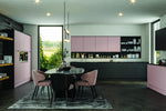 Bella Integra Full Handle supermatt blush pink kitchen with dining table and chairs.
