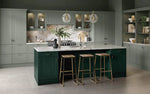 Bella Oakham kitchen with fir green island and sage green cabinet doors.