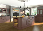 Modern kitchen with wooden island and cabinets, featuring a chandelier.