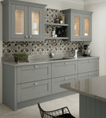 Dust Grey kitchen with tiled backsplash and modern appliances
