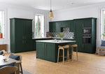Cambridge kitchen with fir green cabinet doors and a central island.