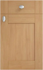 Cambridge Oak cabinet door with two silver handles.