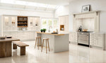 Modern kitchen with cashmere cabinets, mantel kit, island with t&g panelling, and stainless steel appliances.