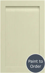 A painted sage green Grantham door. At the bottom right there's a Paint to Order circular sign with a red background and white letters.