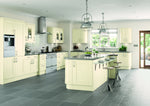 Modern kitchen with cream cabinets and grey tiled floor