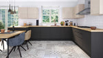 Modern Jayline kitchen with graphite cabinets, wooden countertops, and white tiled walls.