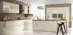 Modern kitchen with off-white cabinets, wooden accents, and a window view.