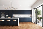 Modern Lucente kitchen with indigo doors, white countertops, and a chandelier.