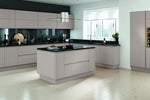 Modern Lucente kitchen with cashmere doors and black countertops