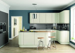 Modern Lucente kitchen with Chalkstone painted doors, wooden countertops, and stools.