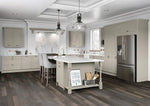 Modern Newmarket kitchen in a painted pebble grey finish with stainless steel appliances and wooden flooring.
