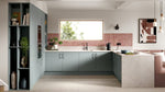 Modern kitchen with grey cabinets, white countertops, and a pink backsplash.