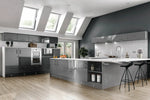 Modern Vivo kitchen with dust grey cabinets, white countertops, and skylights. Features plinth, breakfast panel and a curved end post.