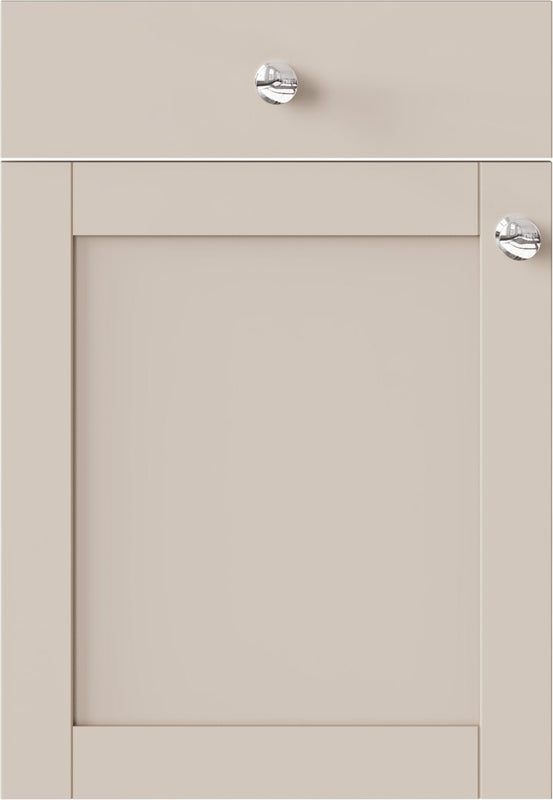 Beige cabinet door with silver knobs 