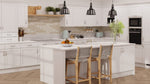 Modern Waterford kitchen with light grey cabinet doors, marble countertops, and wooden flooring.