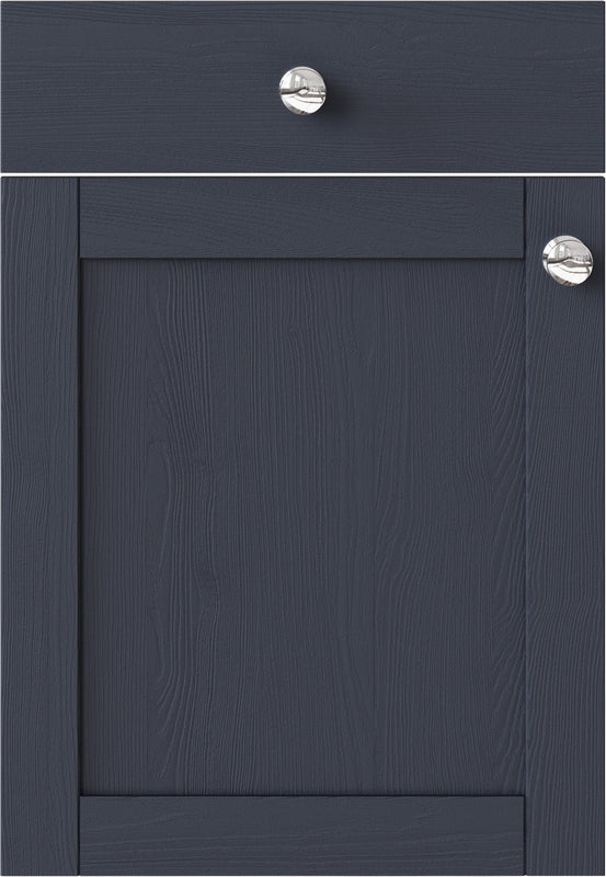 Dark blue cabinet with silver knobs