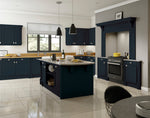 Modern kitchen with dark blue cabinets, island, and appliances.