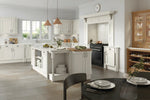 Windsor kitchen with white-grey cabinets and island. Oak cabinet and oak bottle racks.