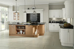 Windsor shaker kitchen with white painted doors and an island with oak doors and accessories.