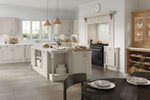 Modern kitchen with white island, wooden cabinets, and dining area.